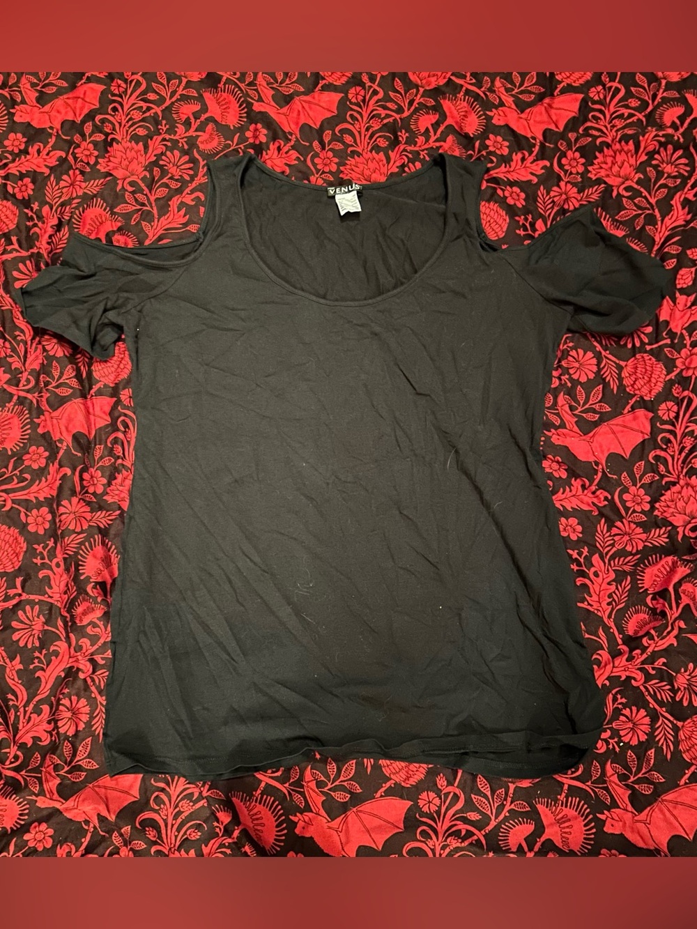 Black Venus short sleeve top with cut out shoulder detail
